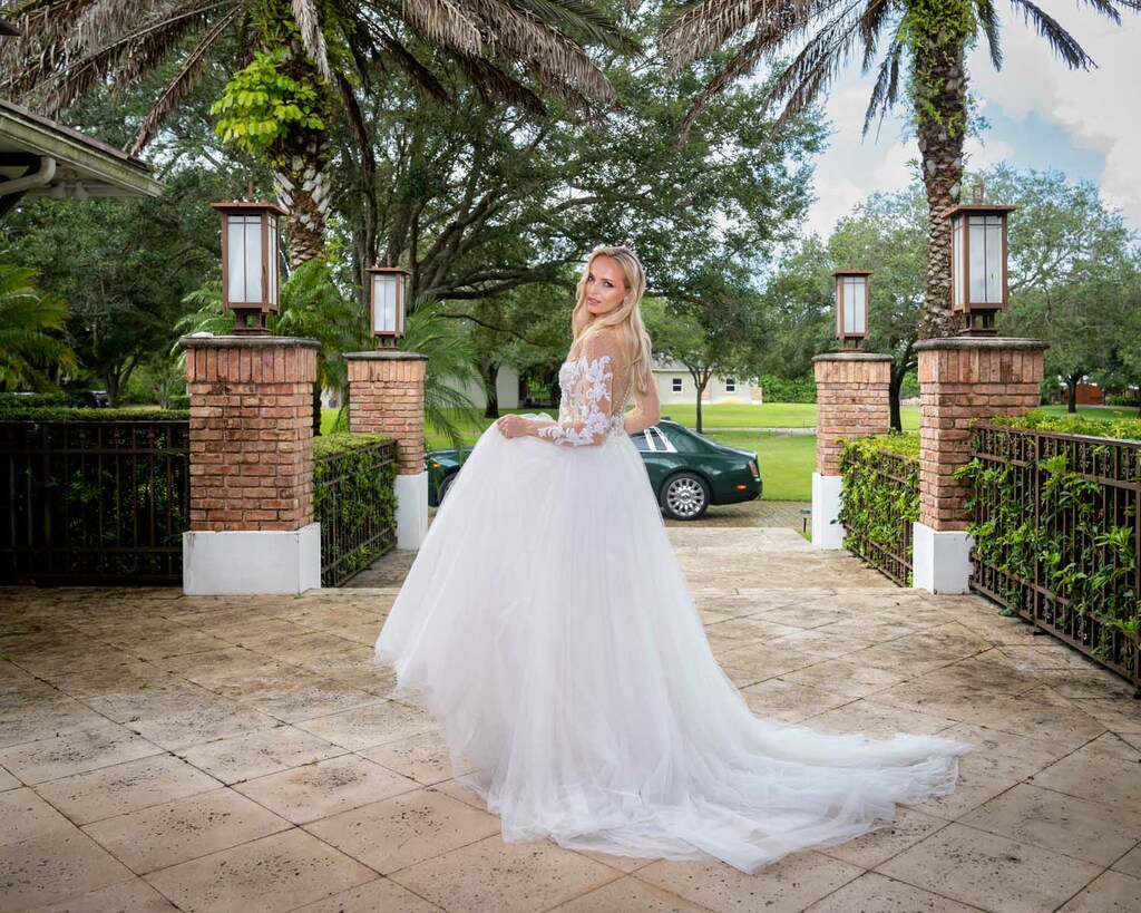Model shows wedding dress for the fashion boutique in Miami, FL.