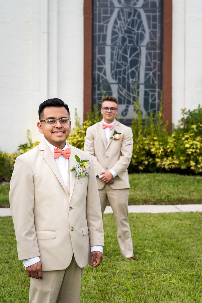 Same-sex couple gets ready for their wedding ceremony together.